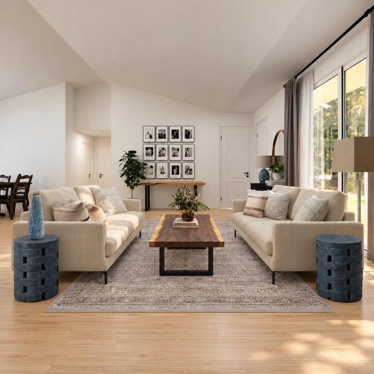 The original living room, styled with Goweeraa Suar wood furniture and stone-effect accents, plus a sofa and rug from Other Collections.